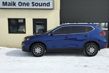 Blue 2019 Nissan Rogue with professional window tint